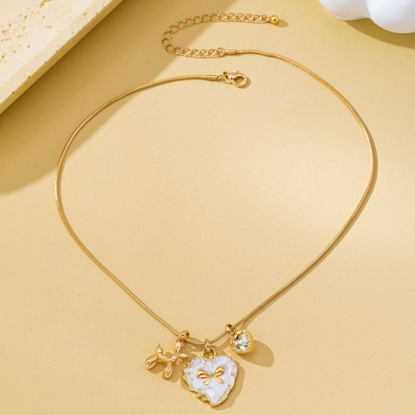 Bow Heart & Balloon Dog Crystal Charm Necklace | 80N93126